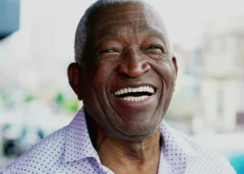 Smiling man looking straight out